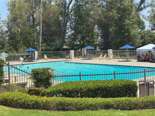 777 Oak Knoll St, Brea, CA 92821 - community pool with a patio and view of wooded area