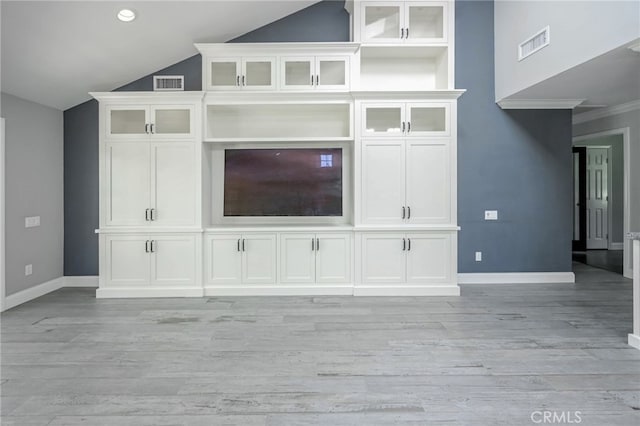 777 Oak Knoll St, Brea, CA 92821 - unfurnished living room featuring vaulted ceiling and light wood-style floors