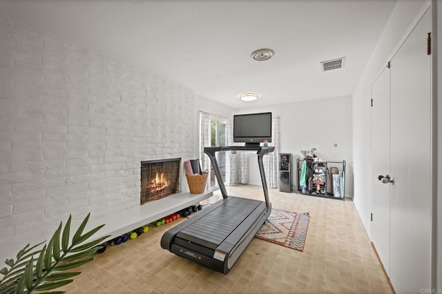 10160 Vista De La Cruz Ln, Mesa, CA 91941 - exercise room with a brick fireplace and baseboards