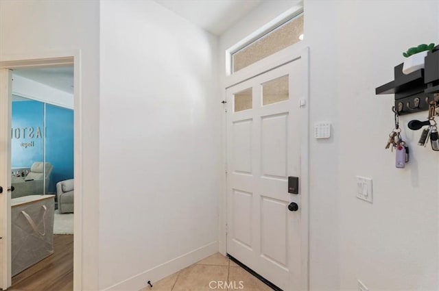 1151 Veramar Ct Unit 101, Corona, CA 92882 - foyer entrance with baseboards and light tile patterned floors