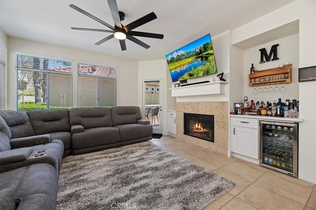 1151 Veramar Ct Unit 101, Corona, CA 92882 - living room with beverage cooler, a dry bar, light tile patterned flooring, a ceiling fan, and a tiled fireplace