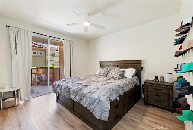 1151 Veramar Ct Unit 101, Corona, CA 92882 - bedroom featuring access to outside, wood finished floors, and a ceiling fan