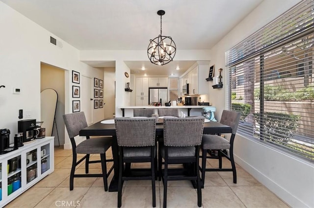 1151 Veramar Ct Unit 101, Corona, CA 92882 - dining space with light tile patterned floors, a chandelier, and plenty of natural light