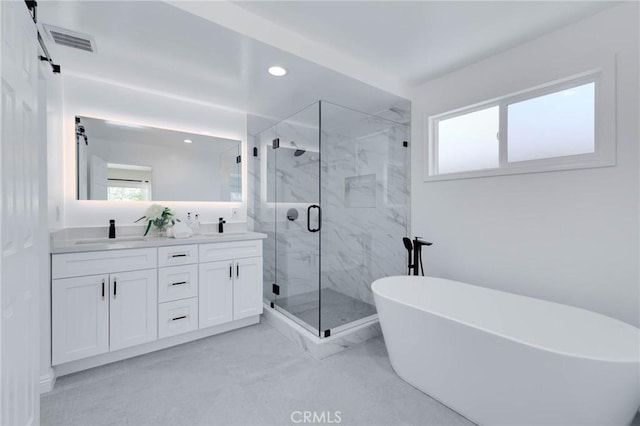 1541 2nd St, Duarte, CA 91010 - full bathroom featuring a freestanding tub, a marble finish shower, double vanity, marble finish floors, and recessed lighting