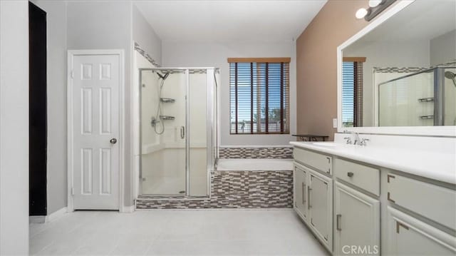 13849 Jackson St, Oak Hills, CA 92344 - bathroom with tile patterned flooring, a bath, vanity, and a stall shower