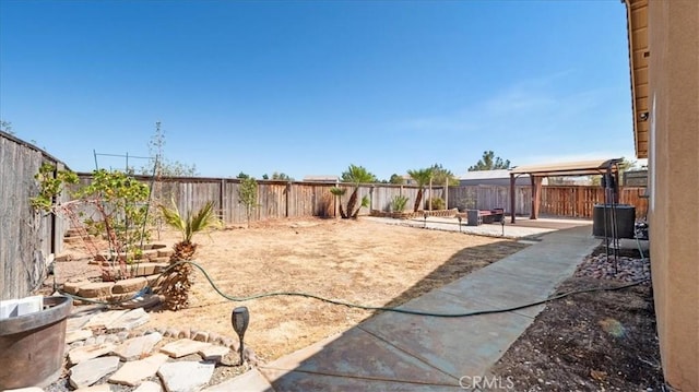 13849 Jackson St, Oak Hills, CA 92344 - fenced backyard with a patio area