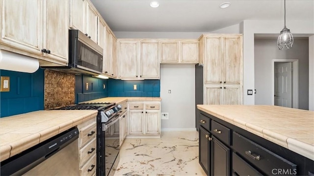 13849 Jackson St, Oak Hills, CA 92344 - kitchen with appliances with stainless steel finishes, light marble finish flooring, tile countertops, recessed lighting, and light brown cabinets