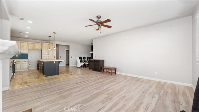 13849 Jackson St, Oak Hills, CA 92344 - living room with light wood-type flooring, a ceiling fan, and recessed lighting