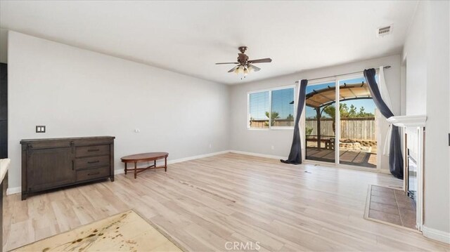 13849 Jackson St, Oak Hills, CA 92344 - unfurnished room featuring a ceiling fan and light wood-type flooring