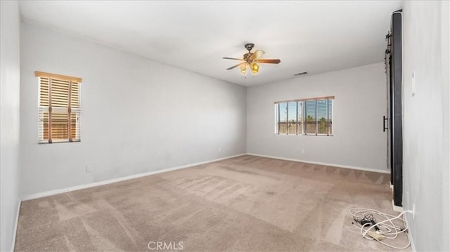 13849 Jackson St, Oak Hills, CA 92344 - unfurnished room featuring ceiling fan and carpet
