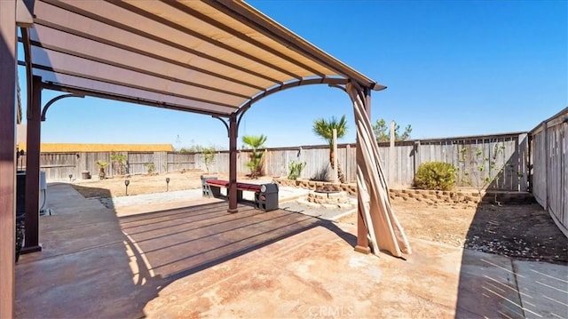 13849 Jackson St, Oak Hills, CA 92344 - fenced backyard with a patio