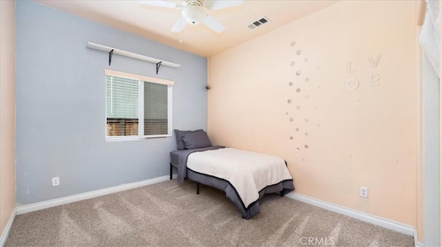 13849 Jackson St, Oak Hills, CA 92344 - carpeted bedroom with baseboards and a ceiling fan