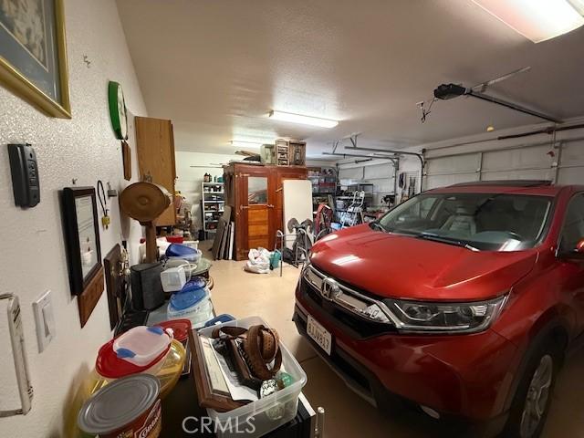 384 Papst Ave, Orland, CA 95963 - garage featuring a garage door opener