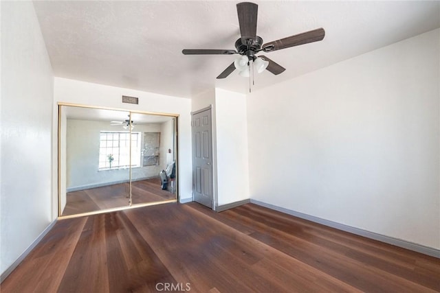 625 Balboa Dr, Corona, CA 92879 - unfurnished bedroom with wood finished floors, a closet, and a ceiling fan