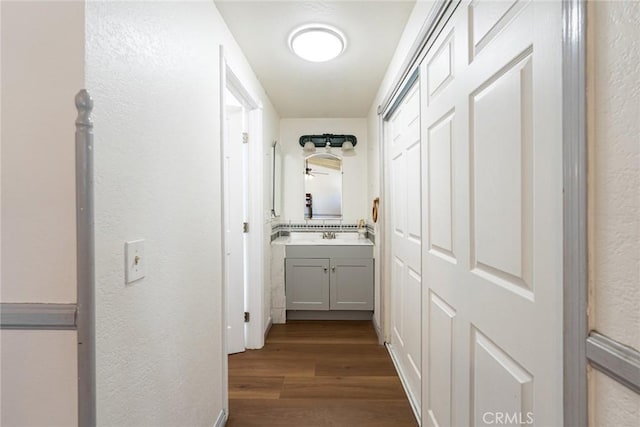 625 Balboa Dr, Corona, CA 92879 - hall featuring dark wood-style flooring and a textured wall