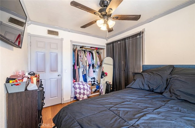 625 Balboa Dr, Corona, CA 92879 - bedroom featuring crown molding, wood finished floors, a closet, and a ceiling fan