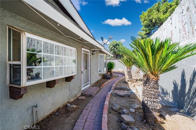 625 Balboa Dr, Corona, CA 92879 - view of side of home featuring stucco siding