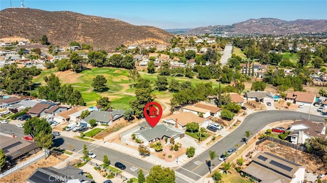 625 Balboa Dr, Corona, CA 92879 - aerial view of property and surrounding area featuring a mountain backdrop and nearby suburban area