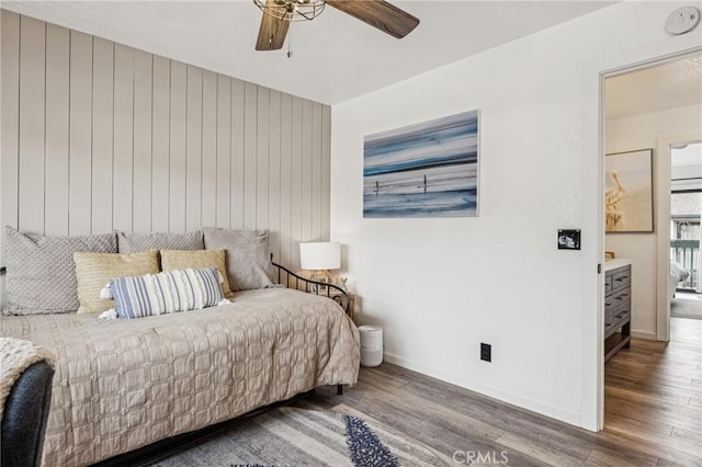2444 La Costa Ct, Oceano, CA 93445 - bedroom with wood finished floors, a ceiling fan, and wood walls