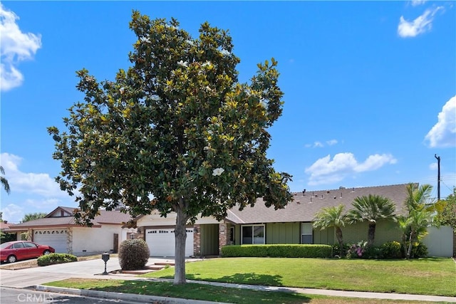 2816 E Alden Pl, Anaheim, CA 92806 - view of front of home with a garage, a front yard, and concrete driveway