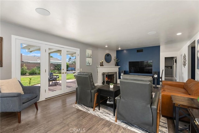 2816 E Alden Pl, Anaheim, CA 92806 - living area with a lit fireplace, wood finished floors, and recessed lighting