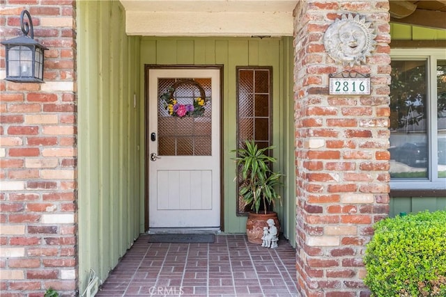 2816 E Alden Pl, Anaheim, CA 92806 - doorway to property featuring brick siding