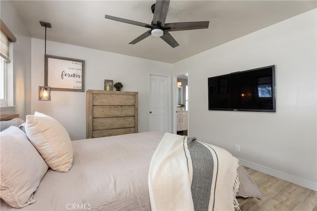 2816 E Alden Pl, Anaheim, CA 92806 - bedroom featuring wood finished floors, connected bathroom, and ceiling fan