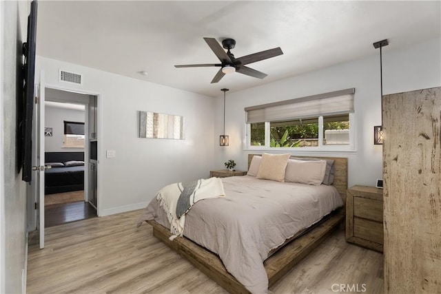 2816 E Alden Pl, Anaheim, CA 92806 - bedroom with light wood-type flooring and a ceiling fan