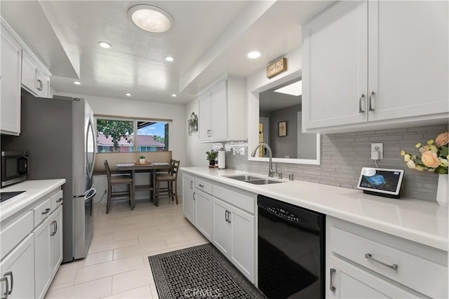 2816 E Alden Pl, Anaheim, CA 92806 - kitchen featuring dishwasher, decorative backsplash, recessed lighting, light countertops, and white cabinets
