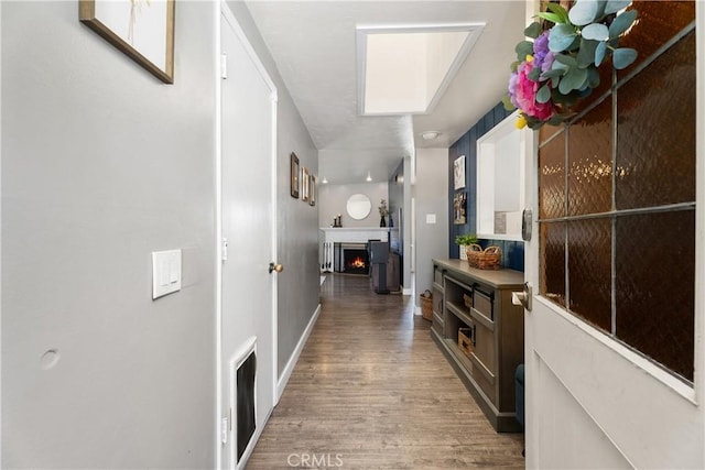 2816 E Alden Pl, Anaheim, CA 92806 - corridor with wood finished floors and baseboards