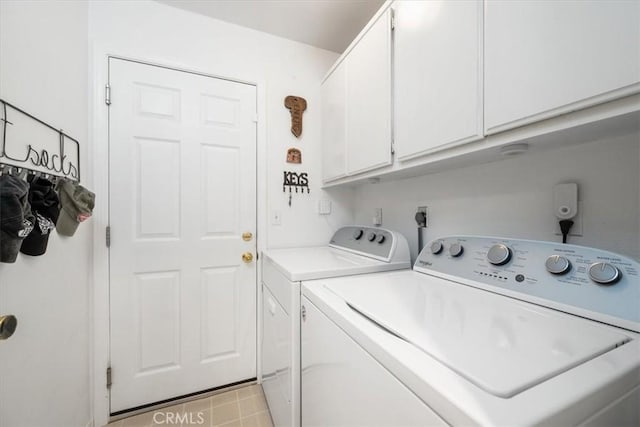 675 Barberry Way, Nipomo, CA 93444 - laundry area with cabinet space and washer and clothes dryer