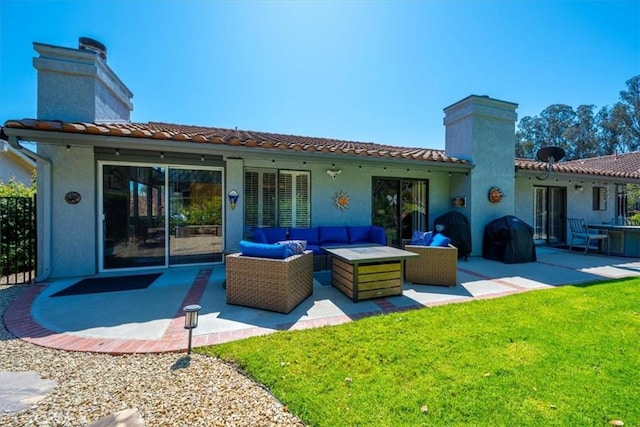 675 Barberry Way, Nipomo, CA 93444 - back of house with a chimney, an outdoor living space, a patio area, and a tile roof