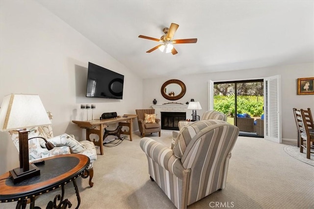 675 Barberry Way, Nipomo, CA 93444 - living room featuring light colored carpet, ceiling fan, vaulted ceiling, and a fireplace