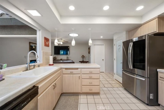 675 Barberry Way, Nipomo, CA 93444 - kitchen with appliances with stainless steel finishes, light brown cabinets, a peninsula, a ceiling fan, and light tile patterned flooring