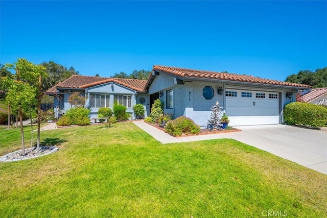 675 Barberry Way, Nipomo, CA 93444 - mediterranean / spanish home featuring a garage, driveway, a front yard, and a tiled roof