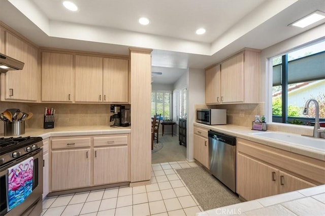 675 Barberry Way, Nipomo, CA 93444 - kitchen featuring appliances with stainless steel finishes, light brown cabinets, plenty of natural light, decorative backsplash, and recessed lighting