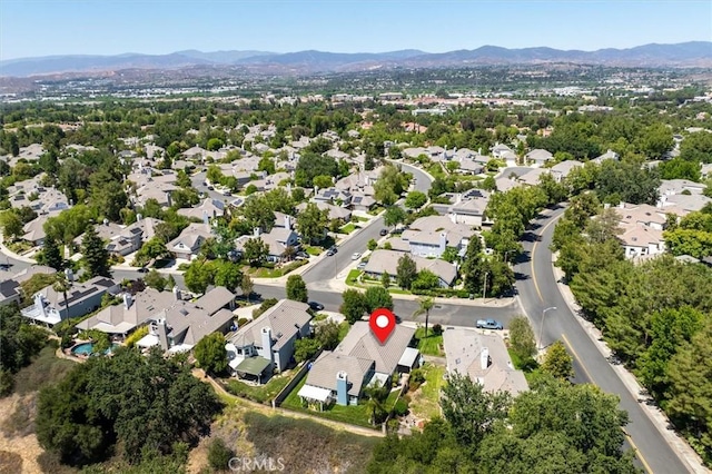 26309 Emerald Dove Dr, Valencia, CA 91355 - aerial overview of property's location with mountains and nearby suburban area