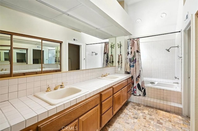 26309 Emerald Dove Dr, Valencia, CA 91355 - full bathroom featuring double vanity and tiled shower / bath combo