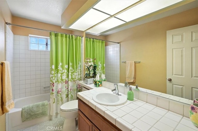 26309 Emerald Dove Dr, Valencia, CA 91355 - full bathroom with shower / bath combination with curtain, vanity, and a textured ceiling
