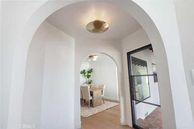 3924 Dublin Ave, Los Angeles, CA 90008 - corridor featuring wood finished floors and arched walkways