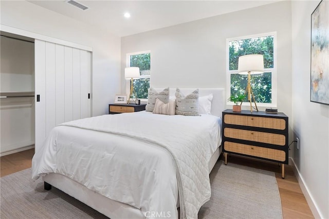 3924 Dublin Ave, Los Angeles, CA 90008 - bedroom featuring wood finished floors, a closet, and recessed lighting