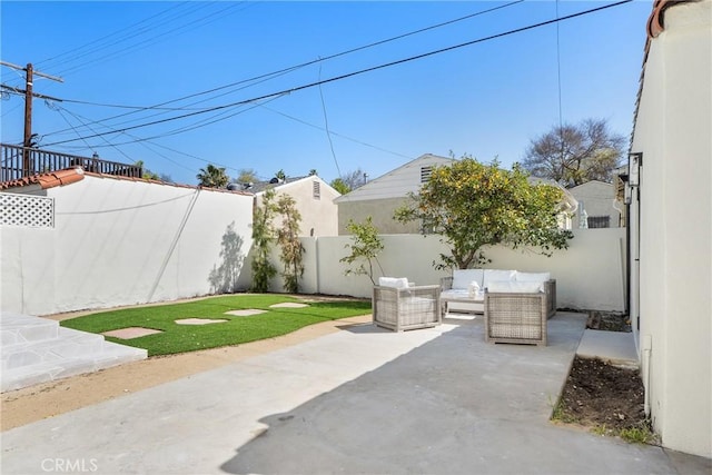 3924 Dublin Ave, Los Angeles, CA 90008 - fenced backyard with a patio area and outdoor lounge area