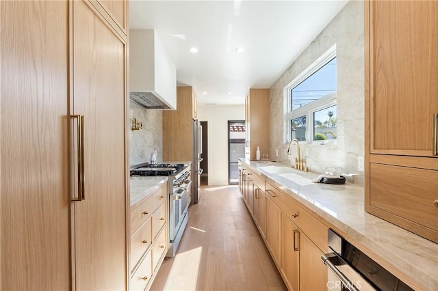 3924 Dublin Ave, Los Angeles, CA 90008 - kitchen with high end appliances, light brown cabinets, light wood-style floors, tasteful backsplash, and recessed lighting