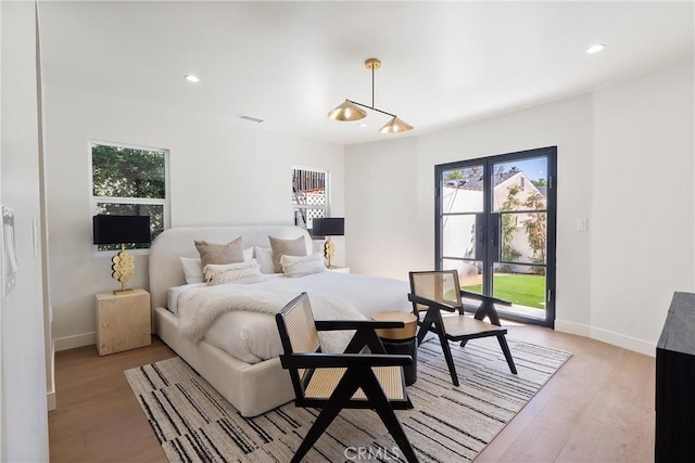 3924 Dublin Ave, Los Angeles, CA 90008 - bedroom featuring light wood-style floors, access to outside, and recessed lighting