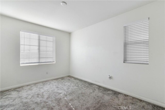 501 Pablo Rd Unit 48, Lake Elsinore, CA 92530 - unfurnished room with carpet and baseboards