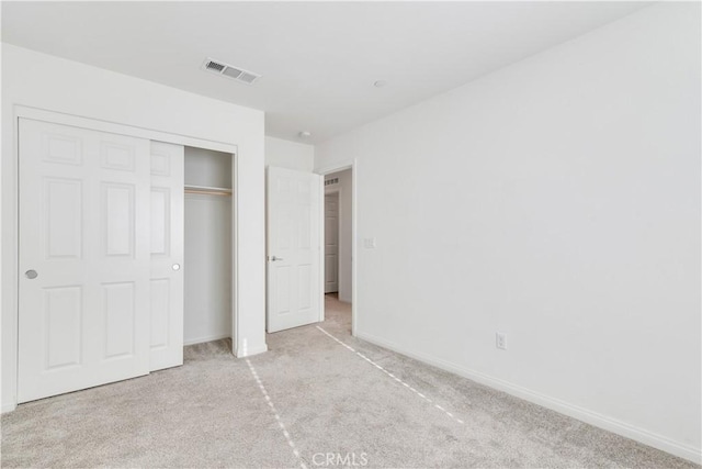 501 Pablo Rd Unit 48, Lake Elsinore, CA 92530 - unfurnished bedroom with light colored carpet and a closet