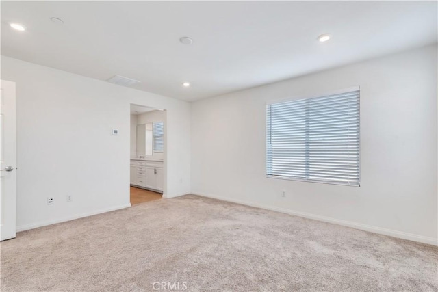 501 Pablo Rd Unit 48, Lake Elsinore, CA 92530 - empty room featuring light carpet and recessed lighting