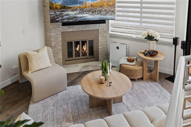 1114 Melrose Ave Unit 3, Glendale, CA 91202 - sitting room with wood finished floors and a fireplace