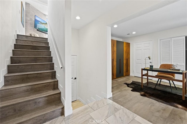 1114 Melrose Ave Unit 3, Glendale, CA 91202 - stairway with recessed lighting and wood finished floors