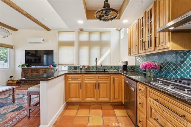 3606 W Chandler Blvd, Burbank, CA 91505 - kitchen featuring under cabinet range hood, decorative backsplash, open floor plan, appliances with stainless steel finishes, and dark stone countertops